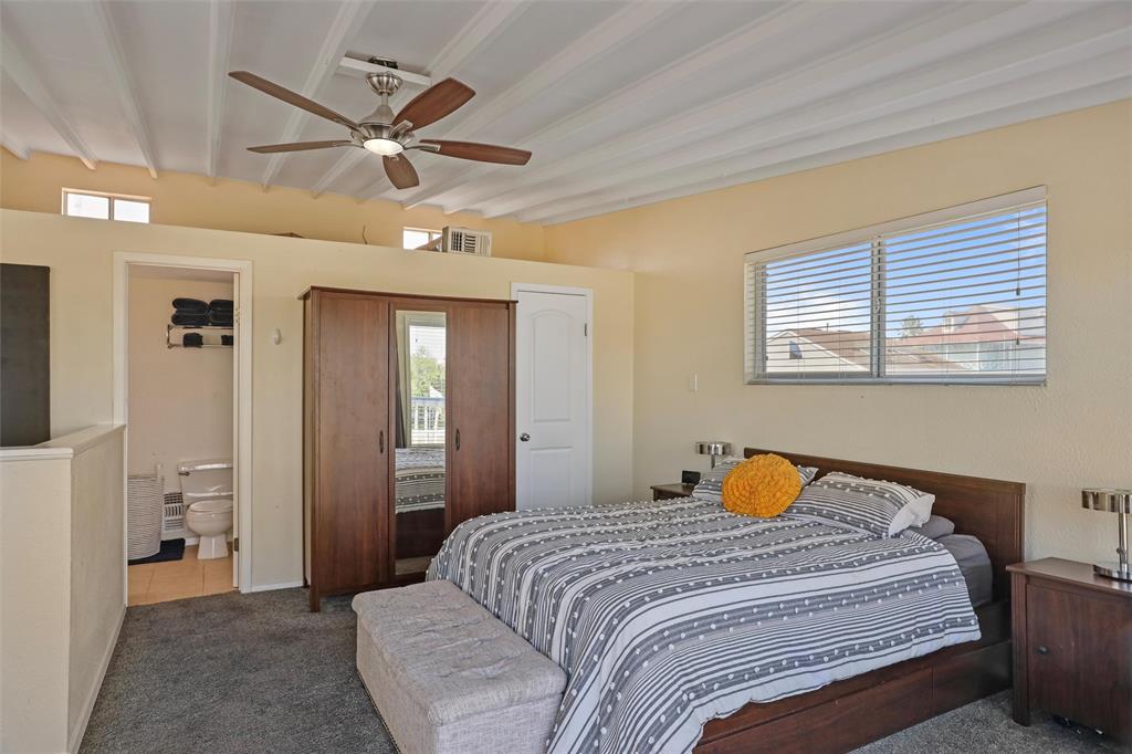 The Primary Bedroom is located upstairs, and leads to a private deck.