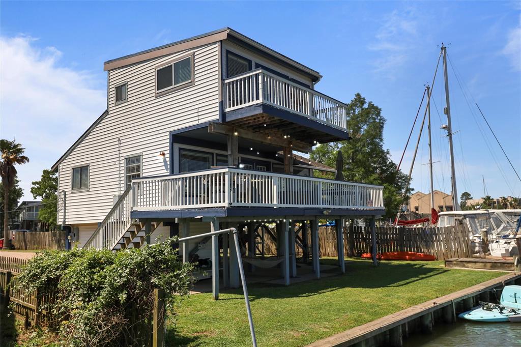 View of the Front of the home offers great porches and space below for a hammock and storage.