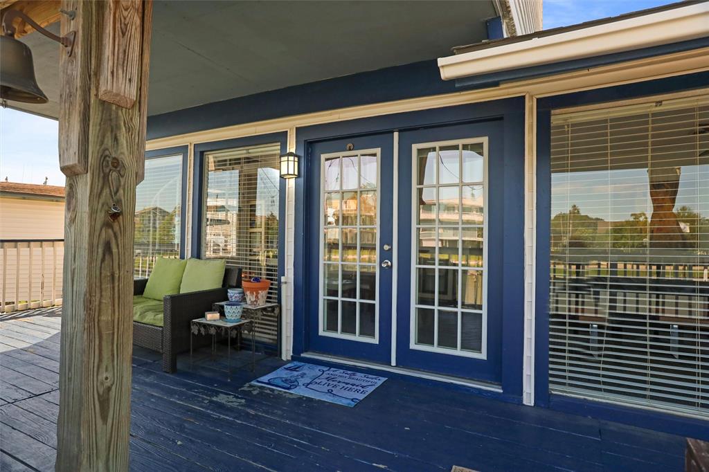 As you enter through the double French doors, you have a beautiful view with a wall of windows providing natural lighting.