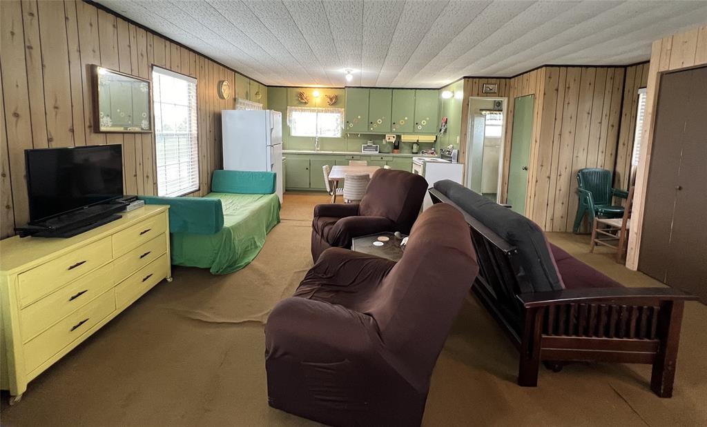 Kitchen located at back of home.