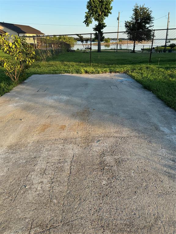 Garage slab at the top left of lot. The other side looks out to the other side of the peninsula.