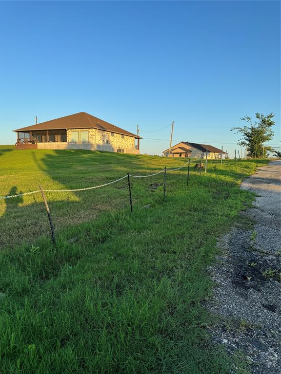 Homes to the right of lot.