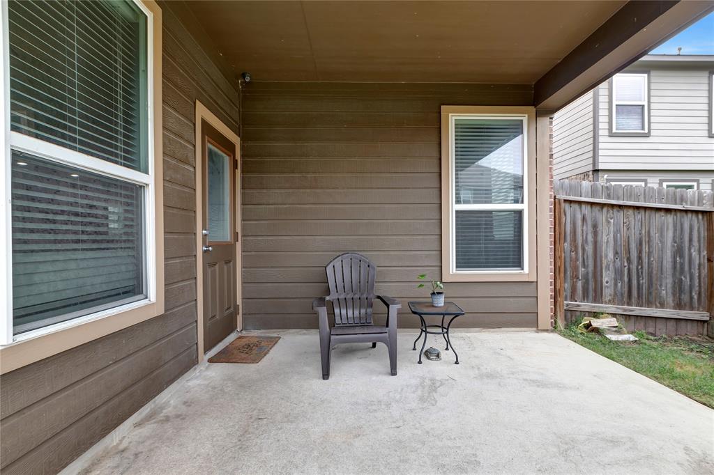 A view of the back patio and door to the living room.