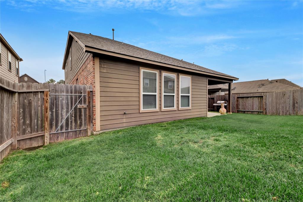 Fully fenced backyard.