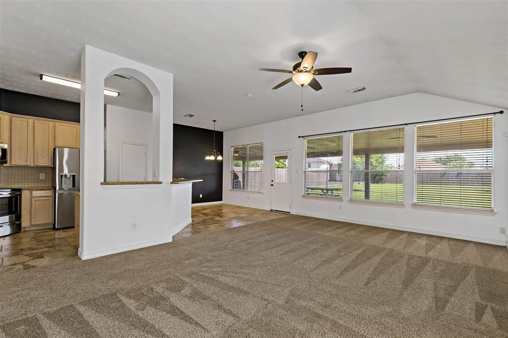 Natural sunlight floods into the family room