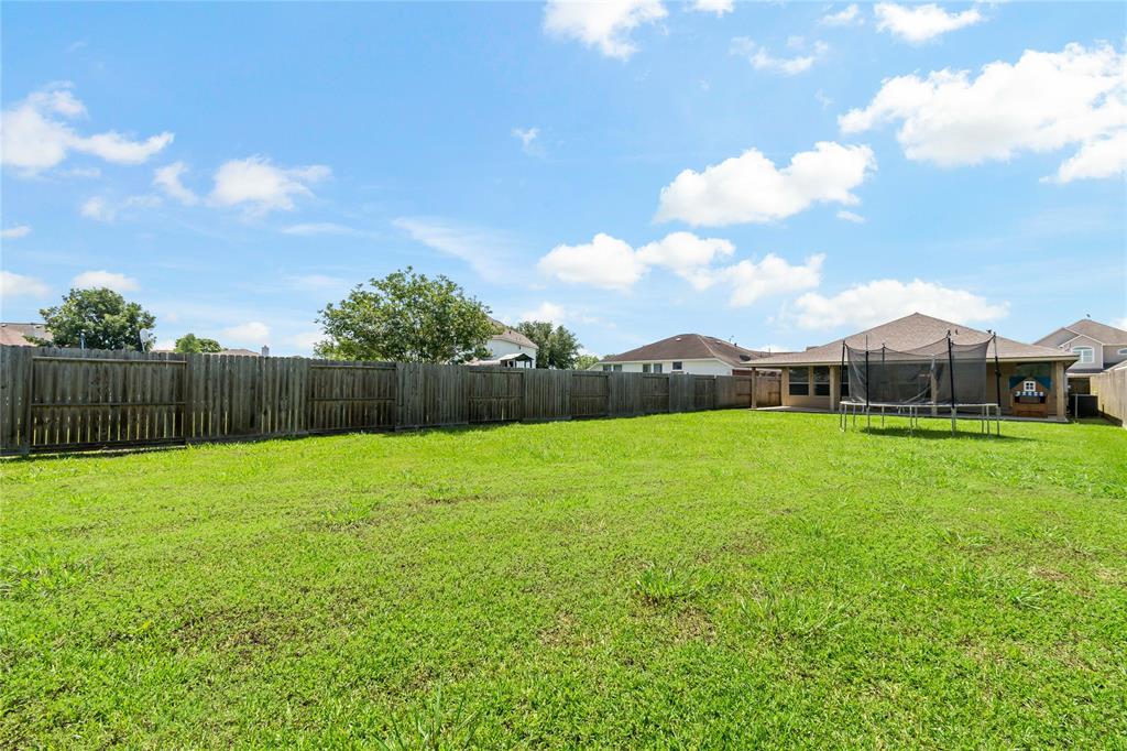 This yard is just waiting for the family, friends and maybe even a pool