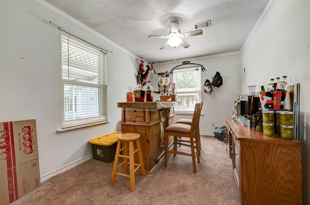 Secondary bedroom that leads to ensuite and laundry room.