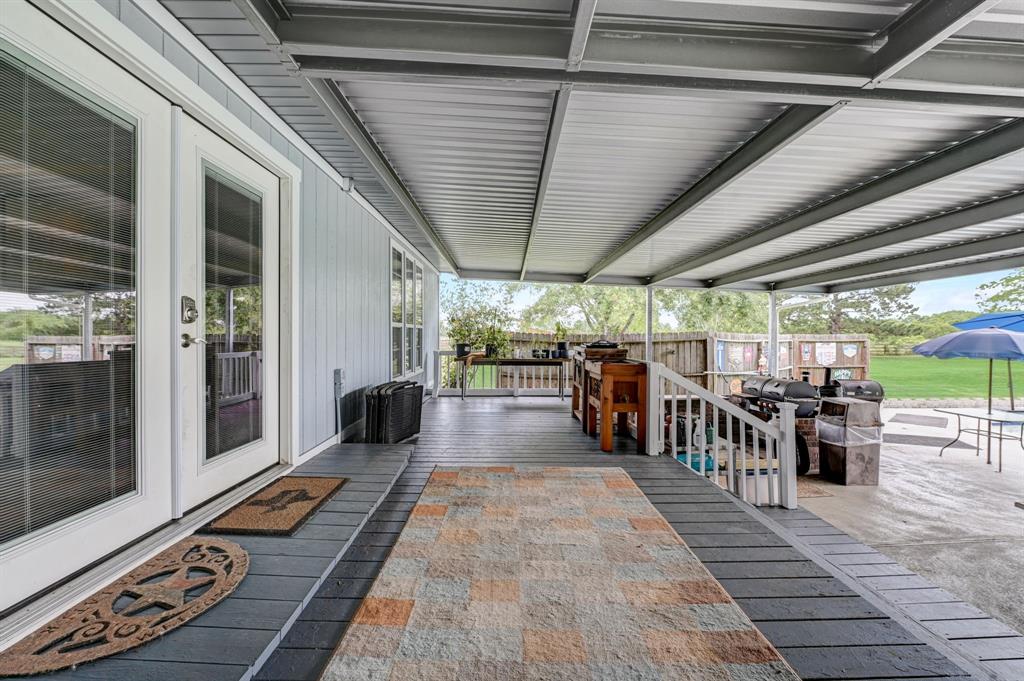 Massive back patio with new cover is the perfect space to entertain guest.