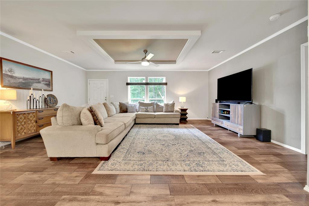 Spacious living room space overlooking the natural landscape that surrounds the home!