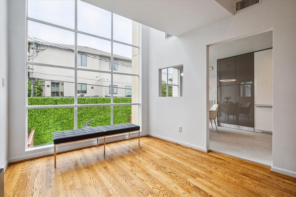 A quiet place to look down at he landscaped yard and pool.