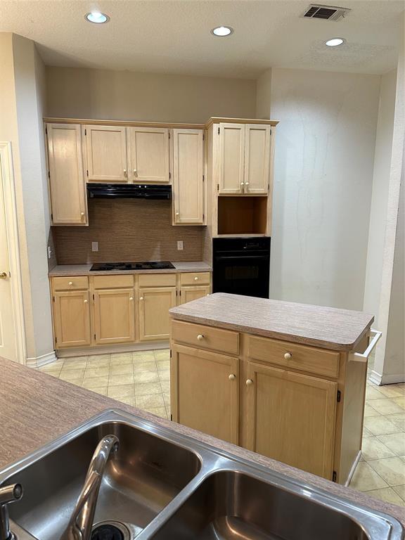 Overlooking the breakfast bar into the kitchen