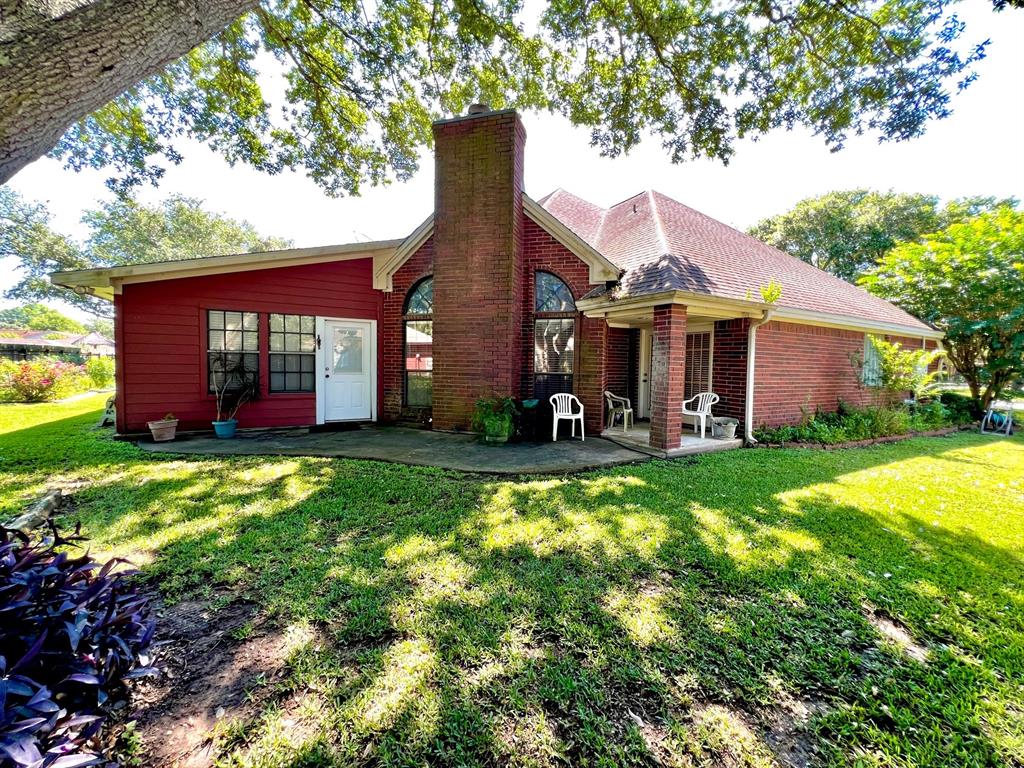 back and side view of house and added sunroom