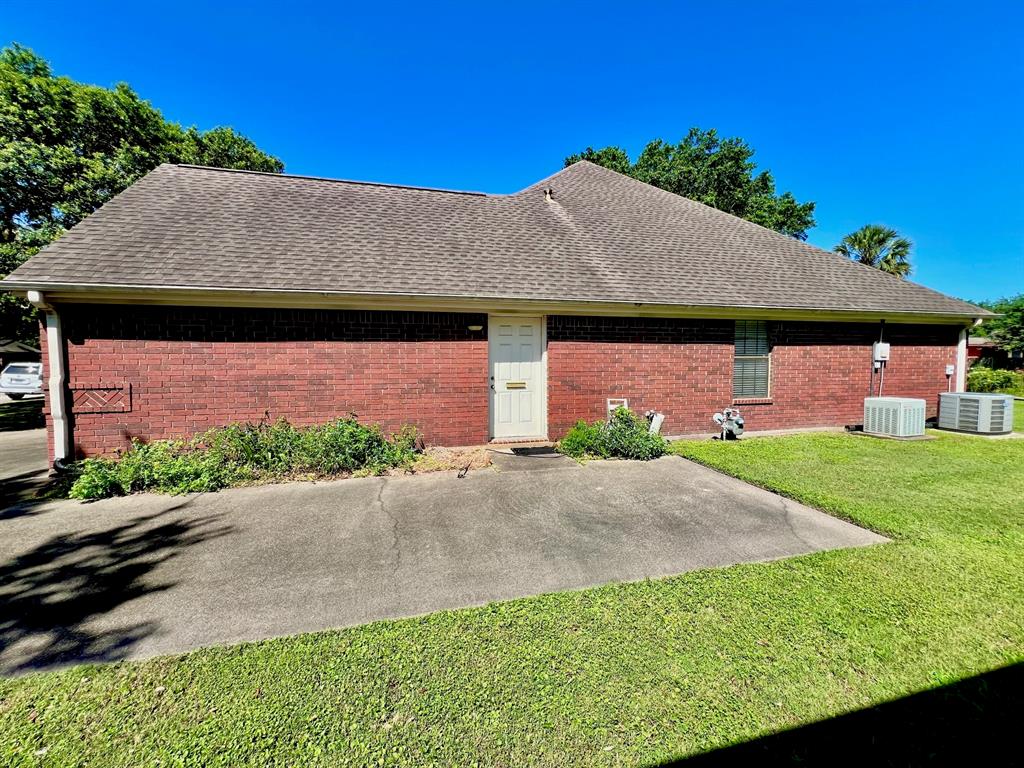 Extended driveway for additional parking on the side of the home