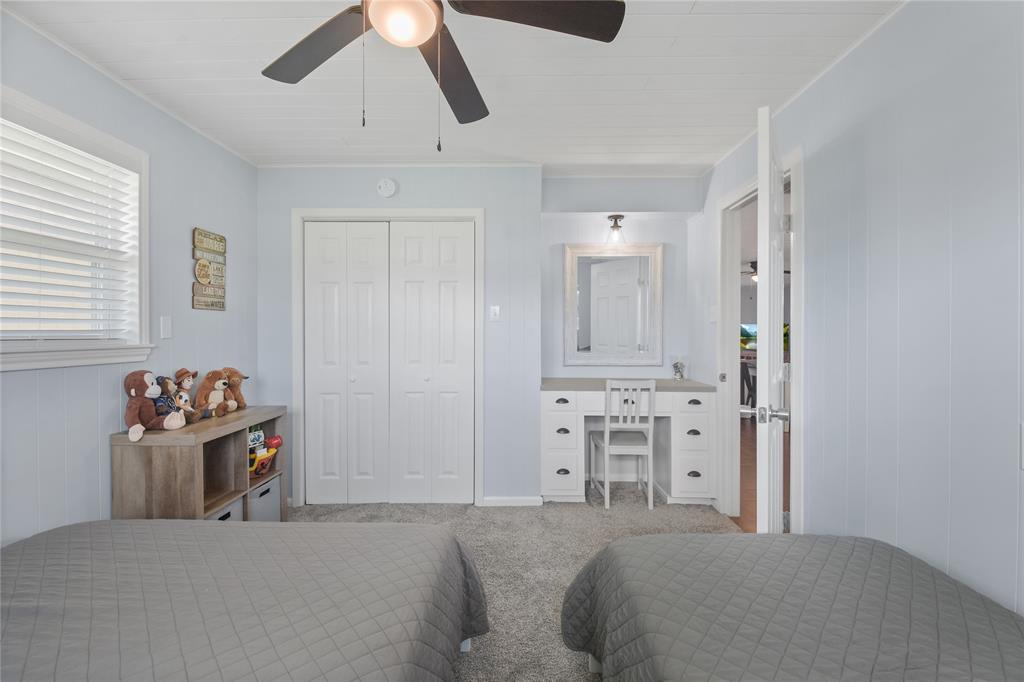 Secondary bedroom also has a built in desk and large closet