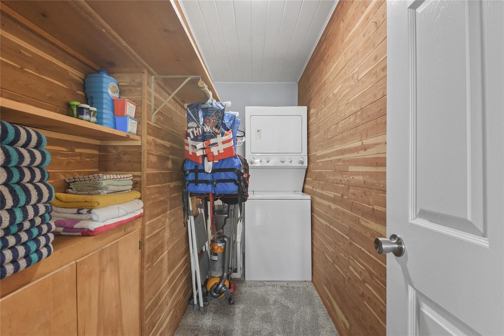 The utility room is located next to the kitchen and also has tons of extra storage space and it\'s even cedar lined!  Washer/Dryer stays too!