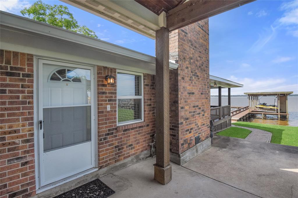 Main entry to home under the carport which is perfect for coming in with groceries