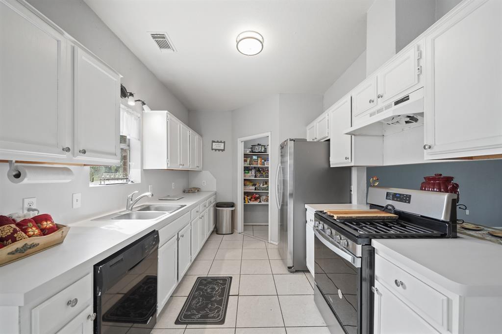 Galley Kitchen with walk in pantry