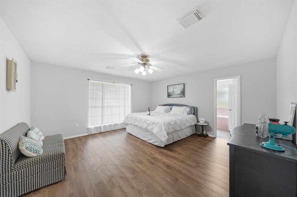 Spacious Primary Bedroom with room for sitting area