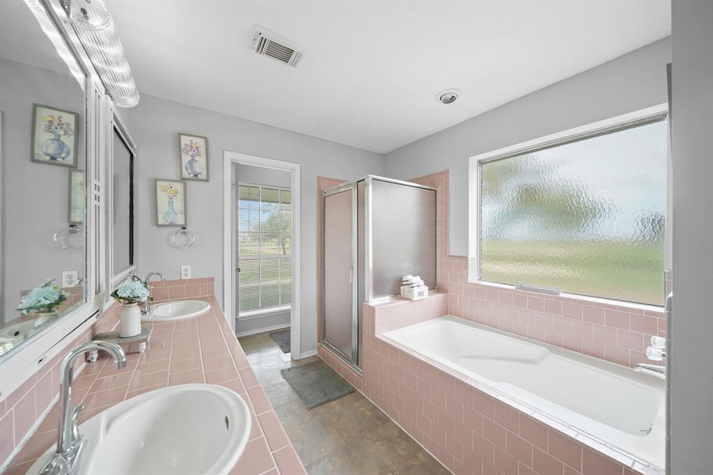 Primary Ensuite with soaking tub and walk in shower