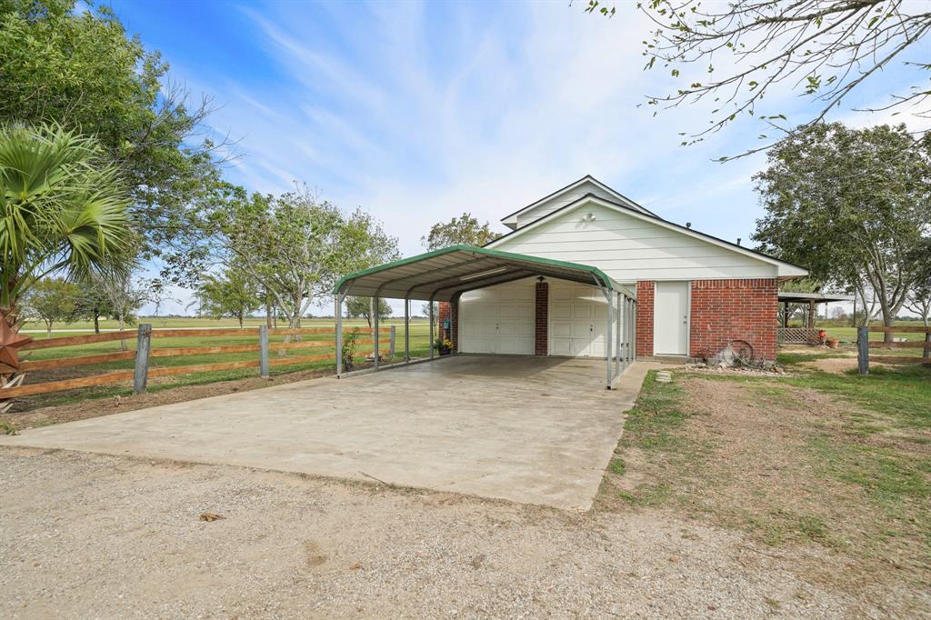 Detached Carport and 2 Car Garage