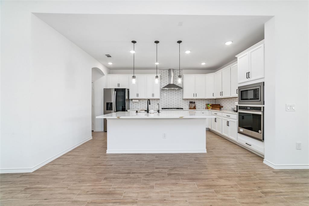 Kitchen with plenty of cabinets and countertop