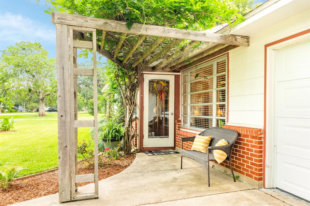 Front door with pergola coverage