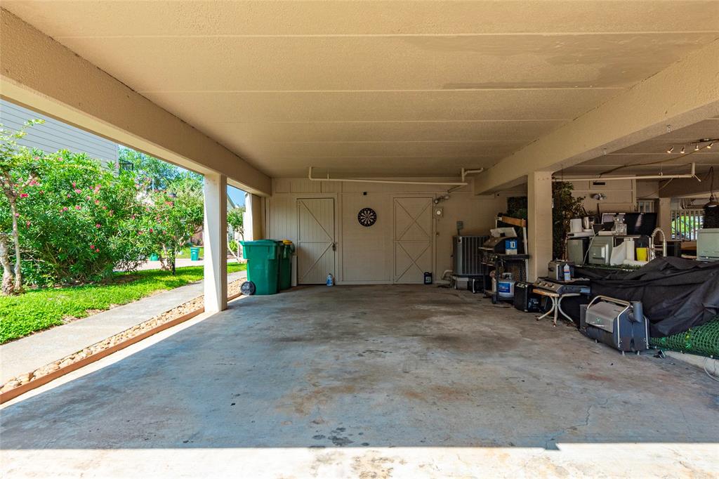 Benefit from the convenience and protection of covered parking in the carport area which also comes with two storage units, ideal for storing seasonal items, outdoor equipment, or other belongings.