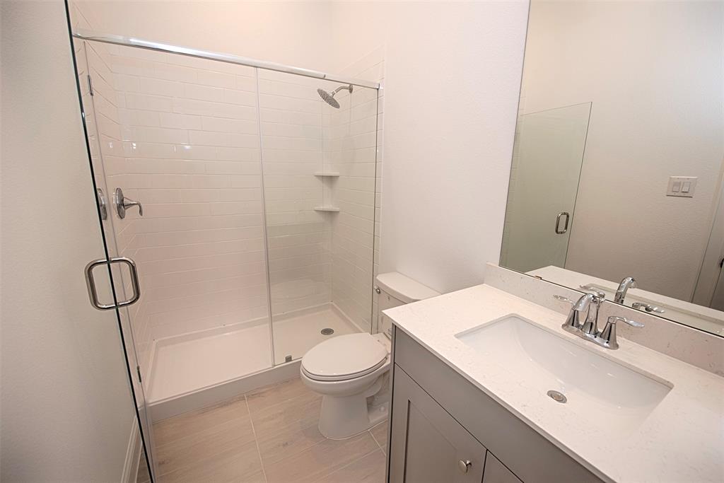 En Suite bathroom with great vanity and walk in shower.