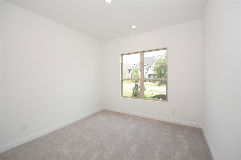 Additional bedroom at the front of the home with lovely views of the front yard.