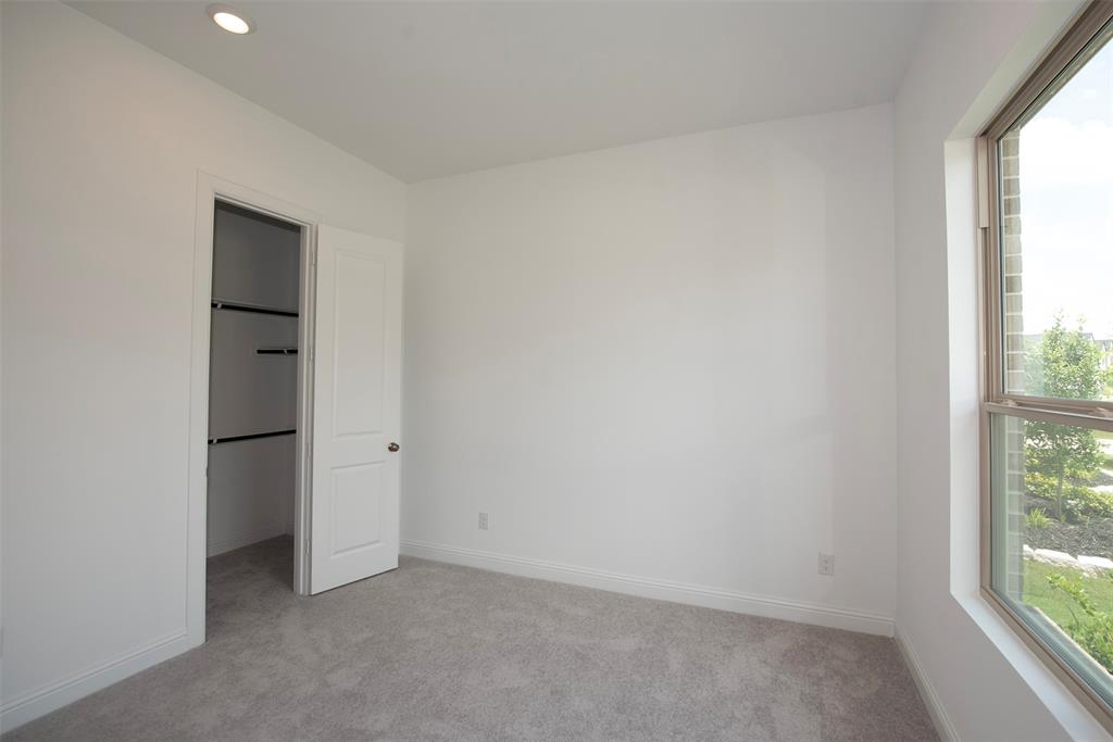 Room provides a walk in closet with great storage.