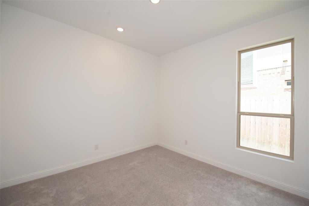 Another spacious bedroom along the side of the home and the perfect size for one of the kids.