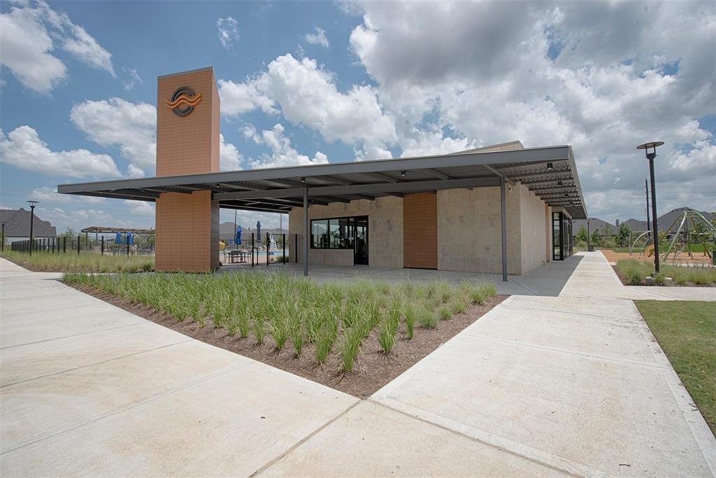 A short distance to the community pool. There is even an exercise gym inside. Soon to be opened. The perfect spot to meet your new neighbors this summer.