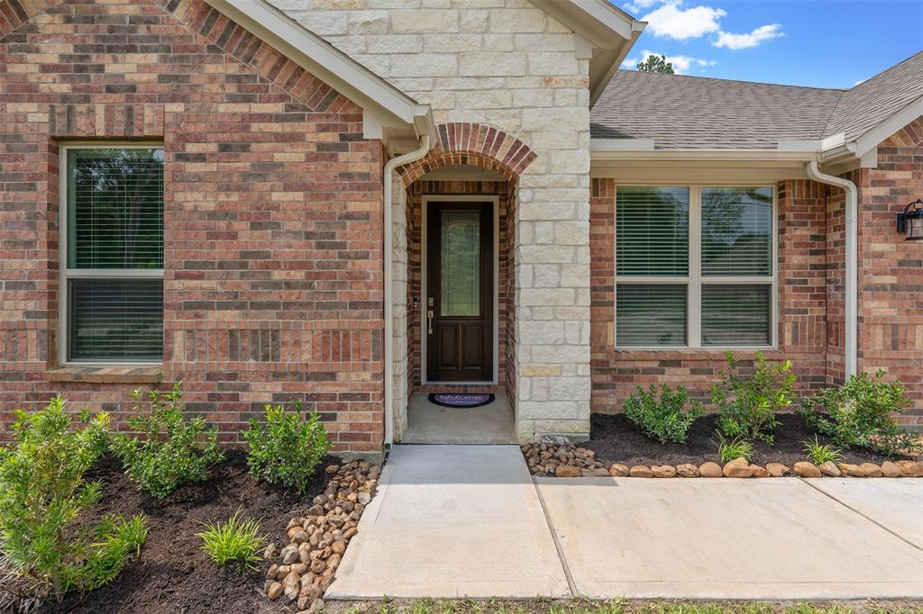 Front Entryway with brick and Stone