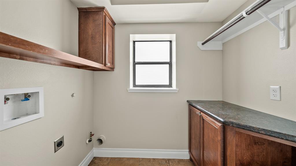 Apartment utility room with built ins