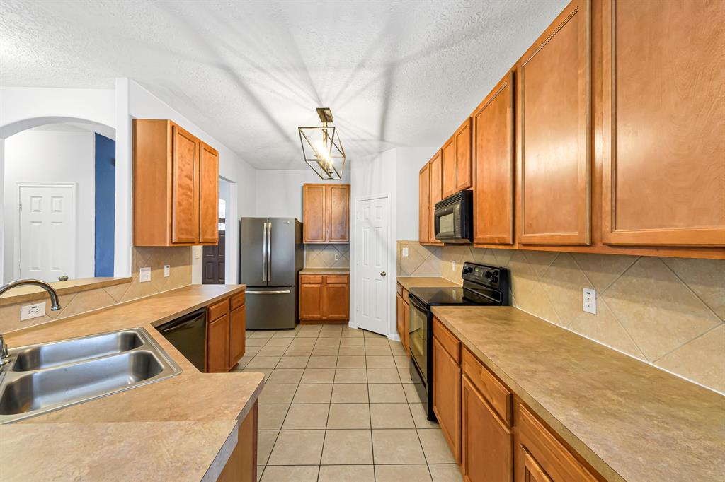 Electric range in kitchen