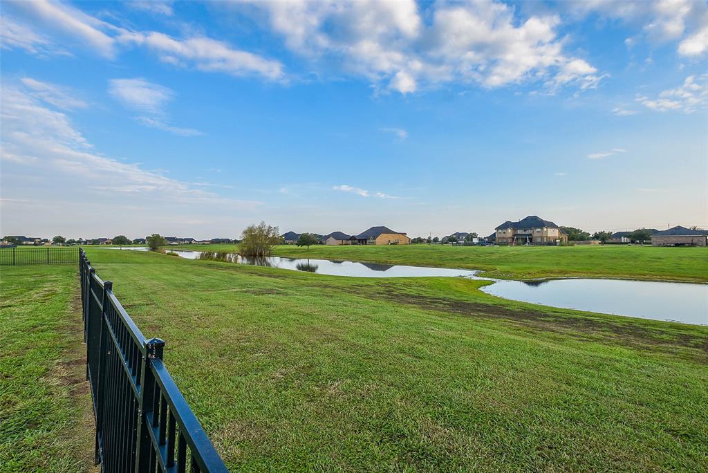 Absolutely breathtaking! Imagine this incredible acreage dotted with fun tables, balloons, banners and lots of happy people at a housewarming bash!