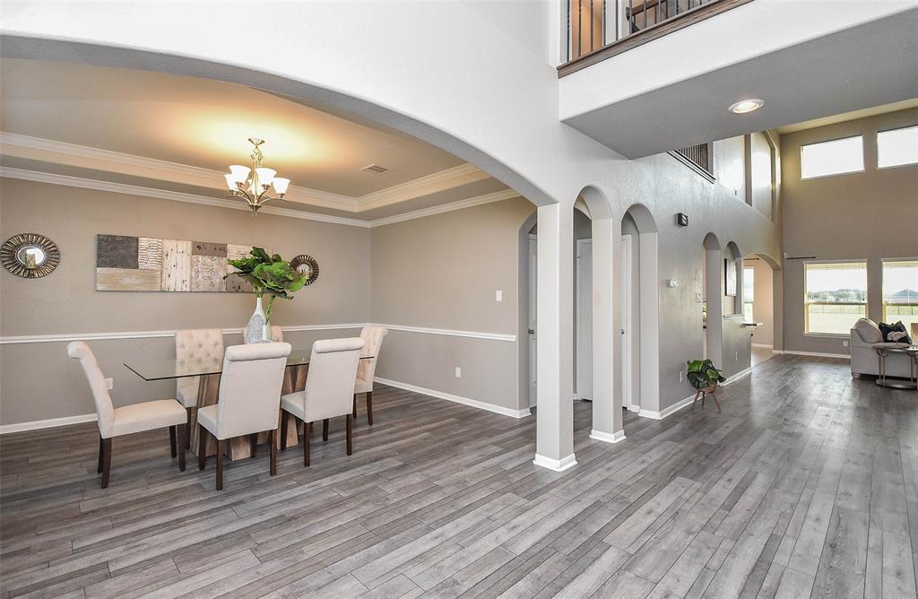 What strikes you first, when you walk into this special residence? High ceilings? Windows everywhere for tremendous natural light? Cool, inviting walls and durable, attractive vinyl flooring throughout? We guess that would be a YES to all!