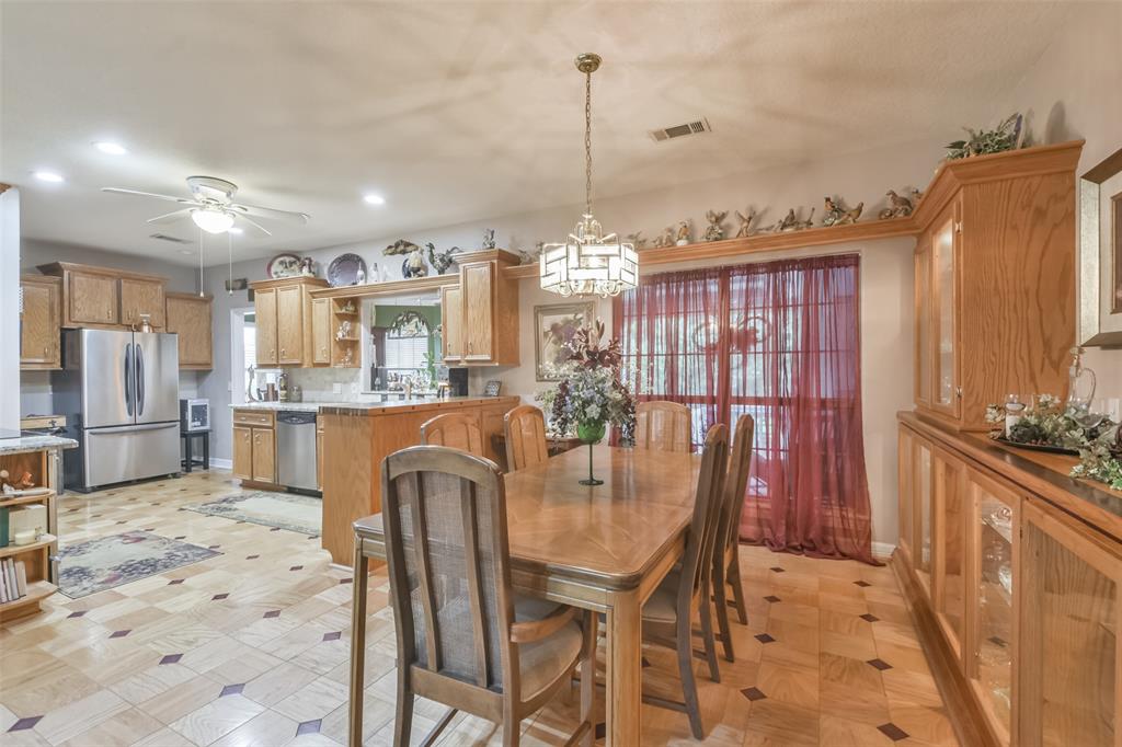 View of dining room and kitchen