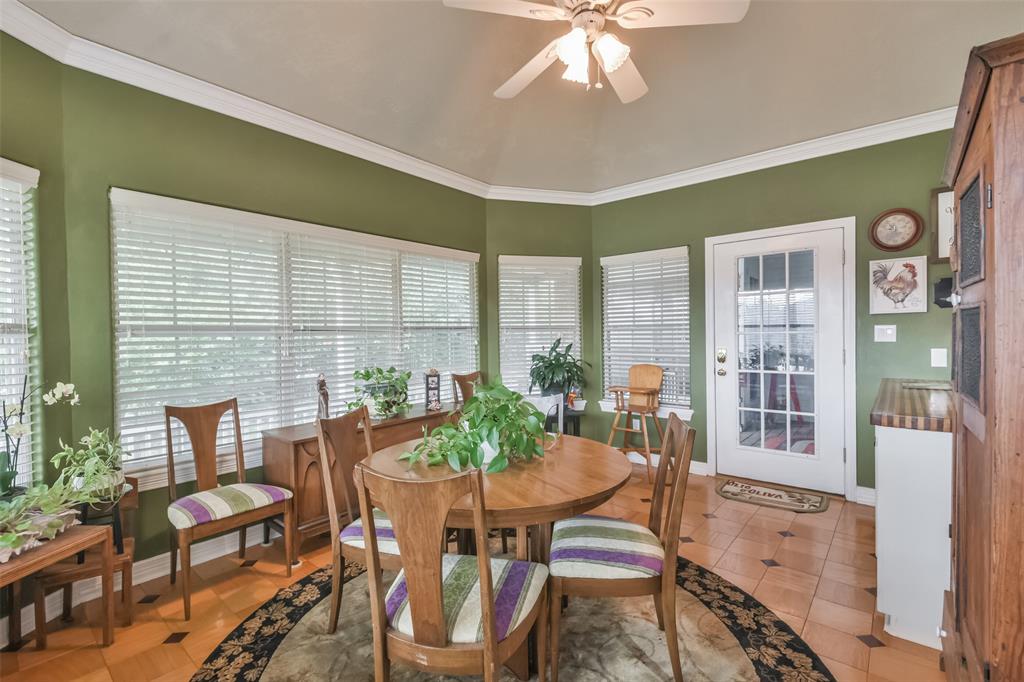 Sunroom with walls of windows