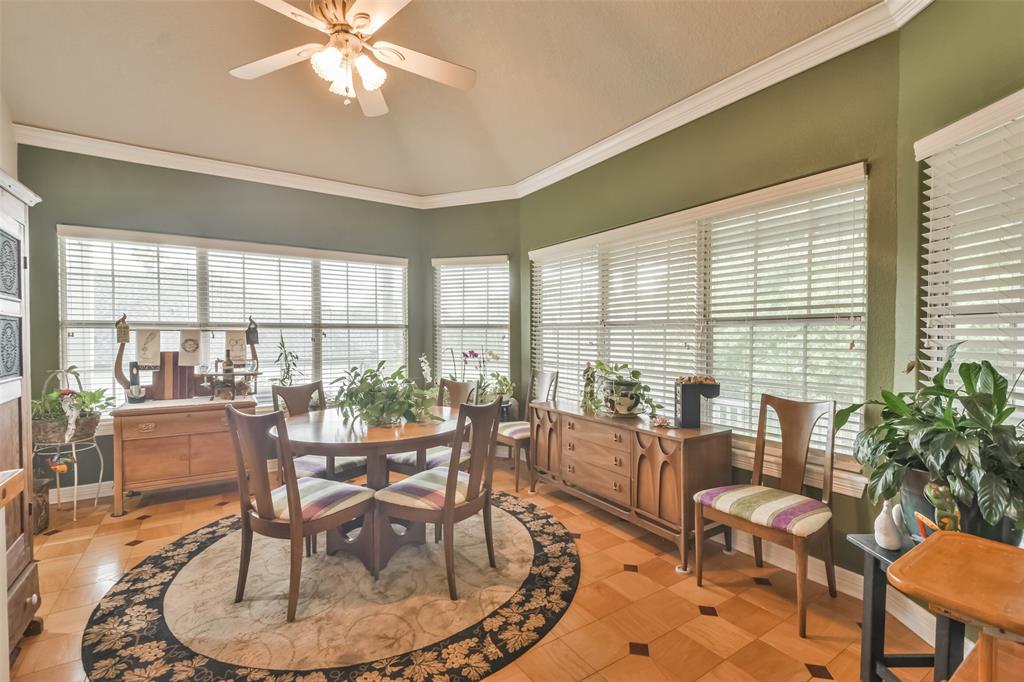 Sunroom with walls of windows