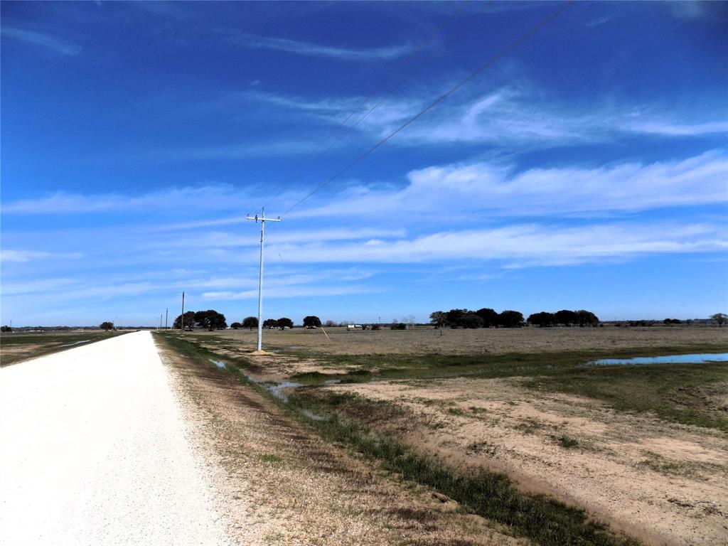 Paved Roads and New Electrical Lines just waiting for you to take advantage of. Here is also another view of the drainage you will find on either side of the lot leading to the ditch at the street.