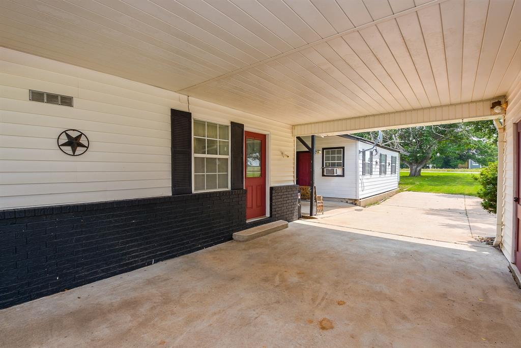 Another view of the amazing carport.  This door opens to the breakfast nook.