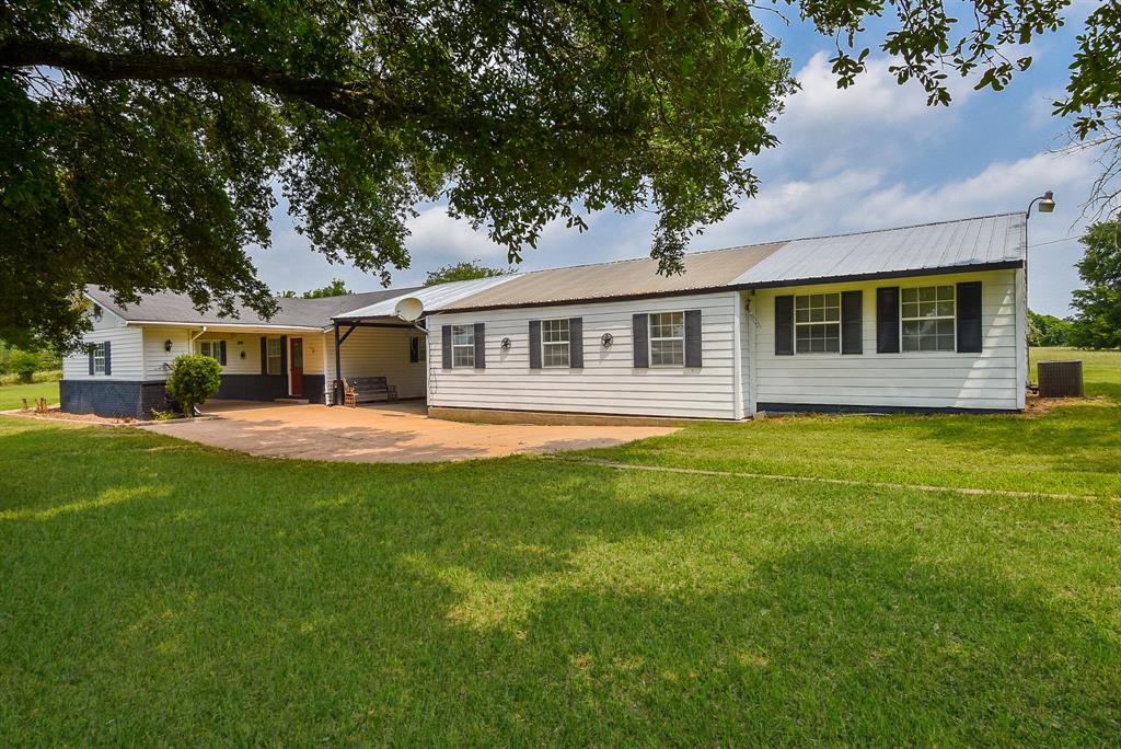 Another view of the home and garage.