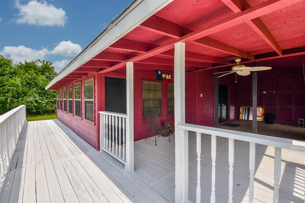 Very nice covered porch for enjoying the outdoors.