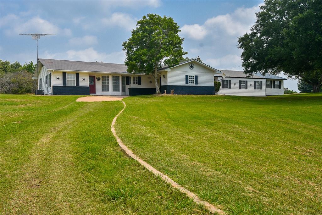 The large front yard offers so much room for outdoor activities.