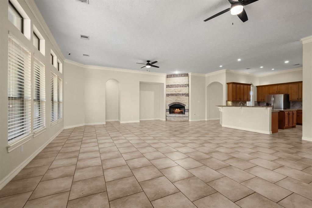 Generous size Family Room.  Beautiful brick FirePlace.