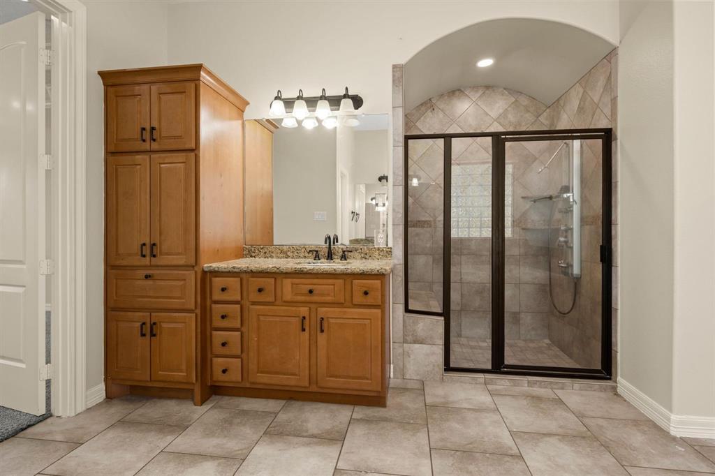 Separate shower and built-in Linen Closet.