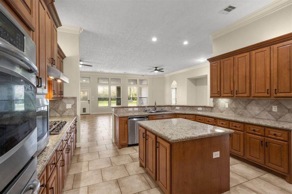 Gas Stove Top.  Great kitchen for the Chef in the family!  Love that counter space!