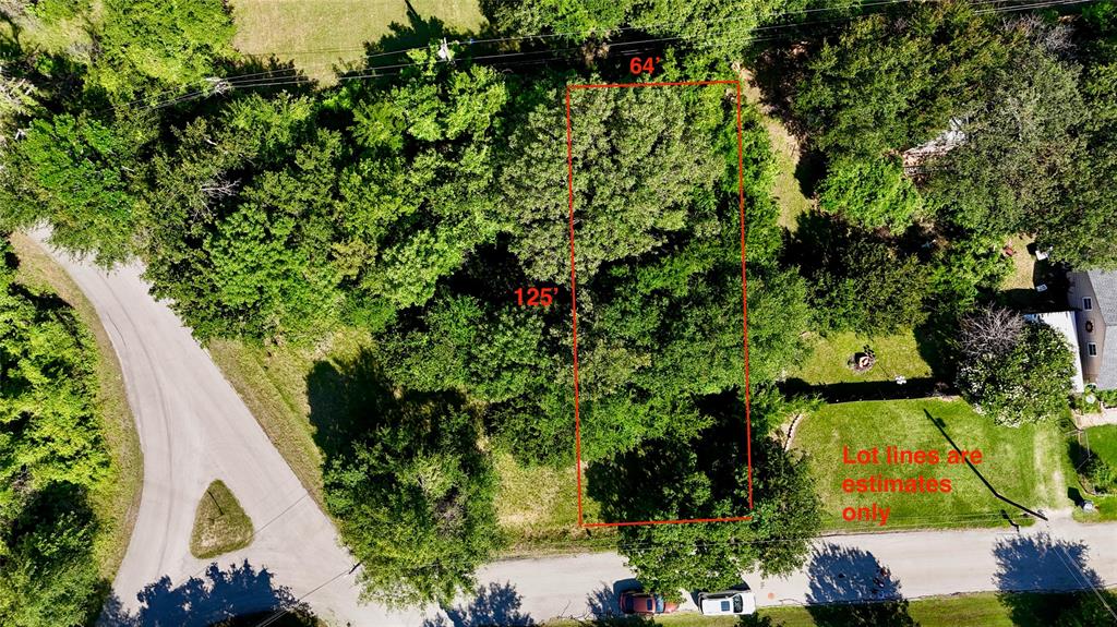 The lot is wooded. Several trees. You may be able to save some of the trees as you build your new home.