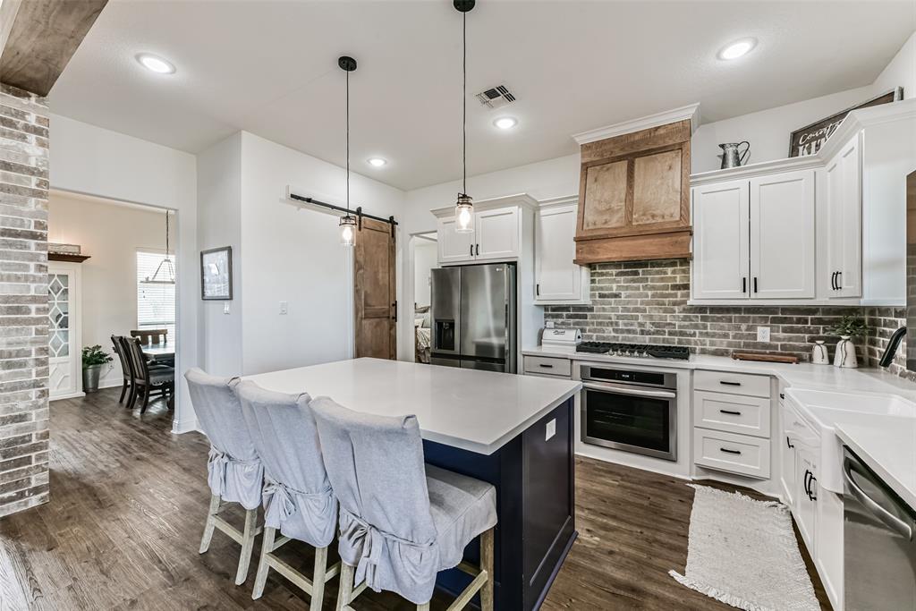 There is space at the breakfast bar to get your morning routine going.